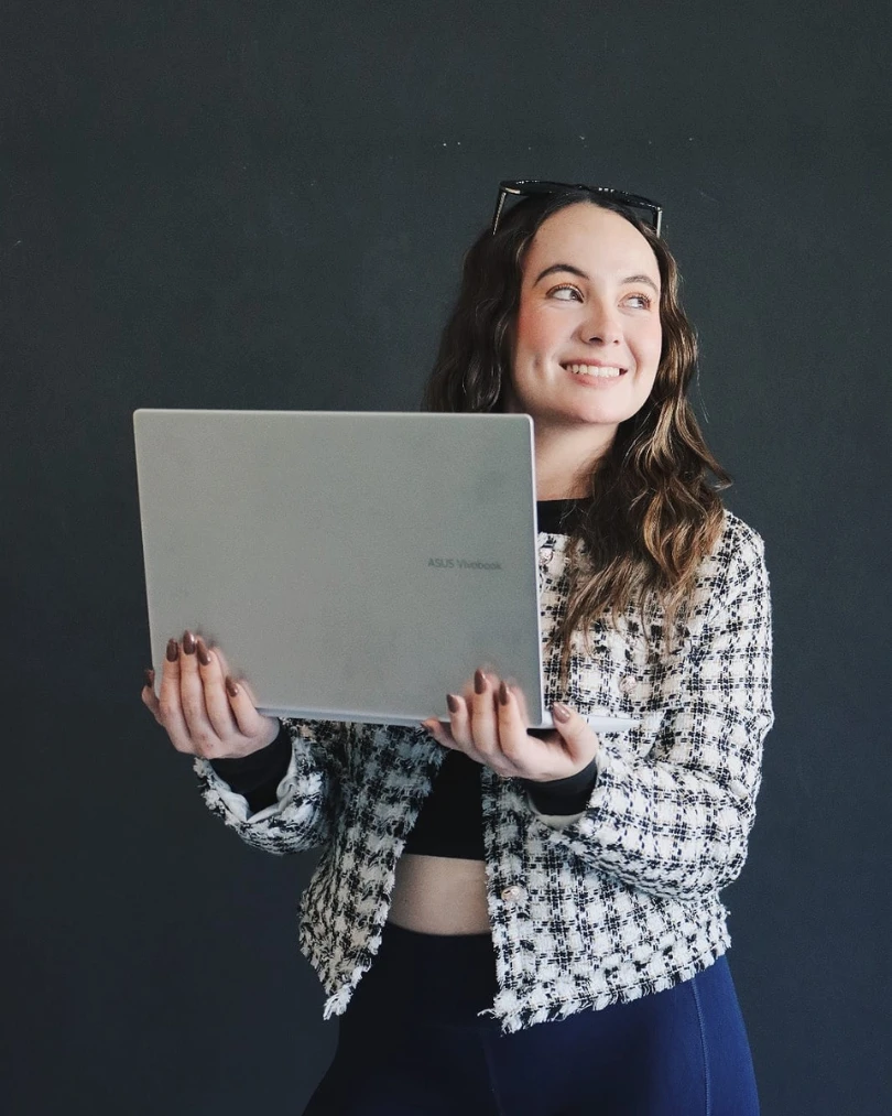 Woman Holding Laptop